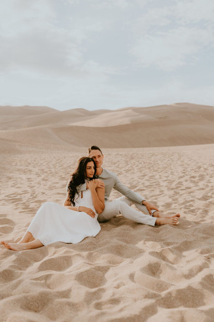 engagement photographer for the sand dunes in colorado, colorado sand dunes engagement inspiration, couples photographer in colorado