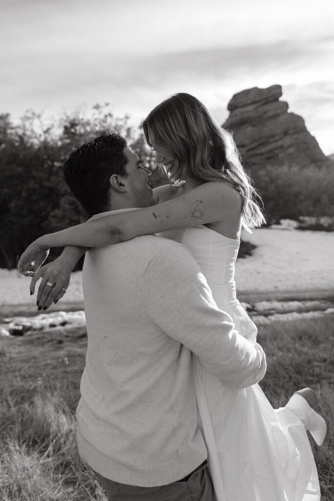 Playful couple at south valley park in littleton colorado