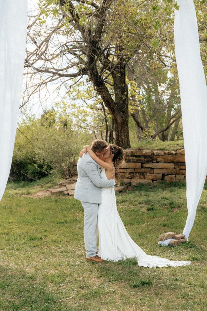 first kiss summer wedding in mountains